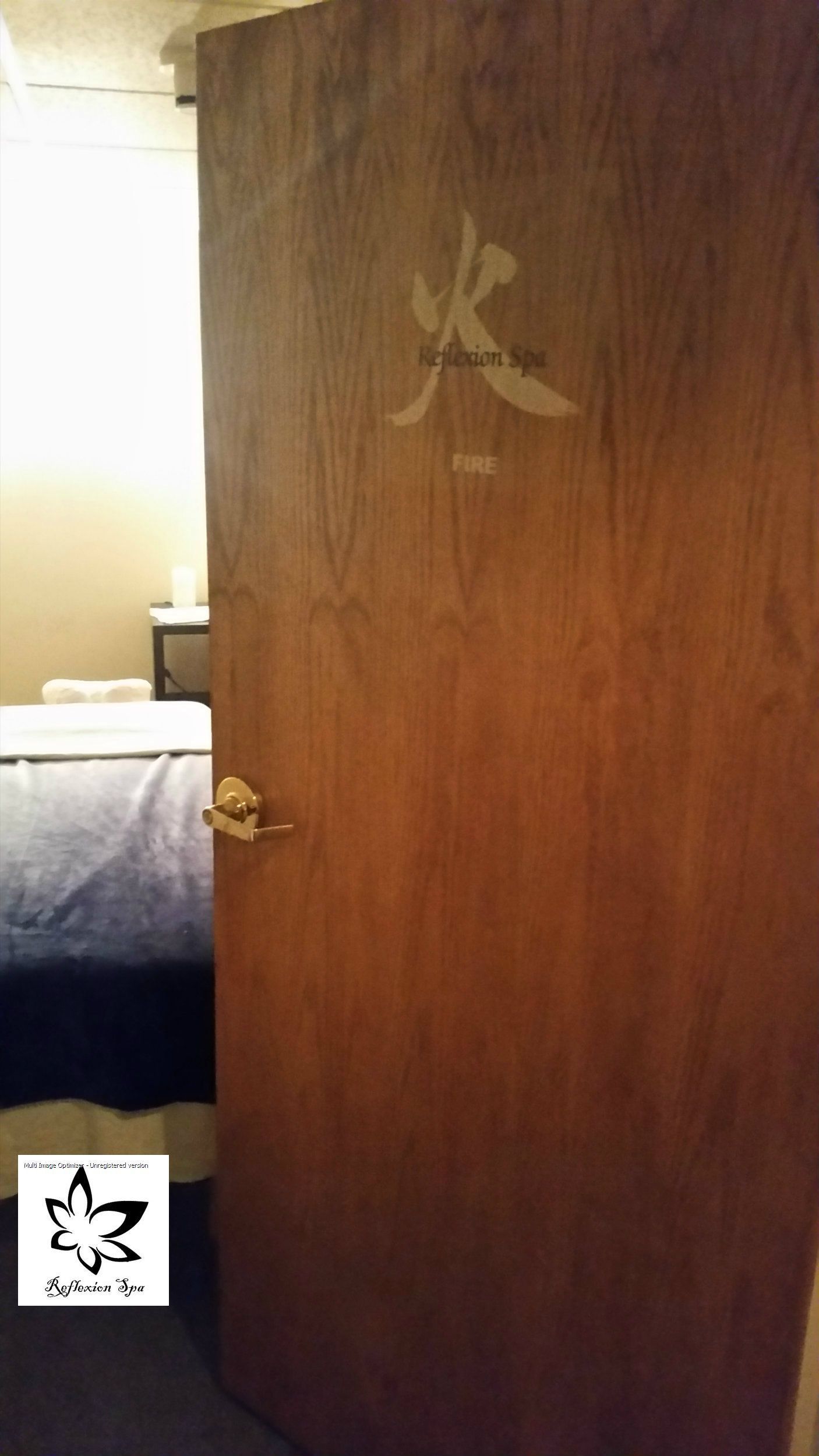 A wooden door with chinese writing on it