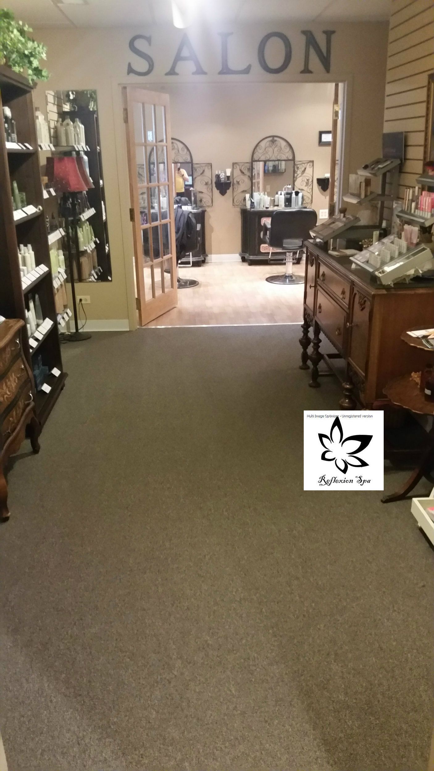 A picture of a salon with a maple leaf on the floor
