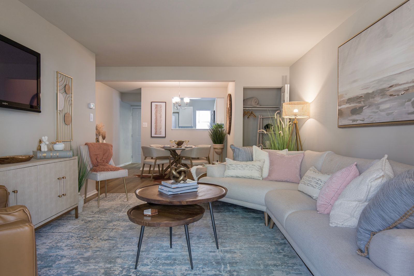 A living room filled with furniture and a flat screen tv.