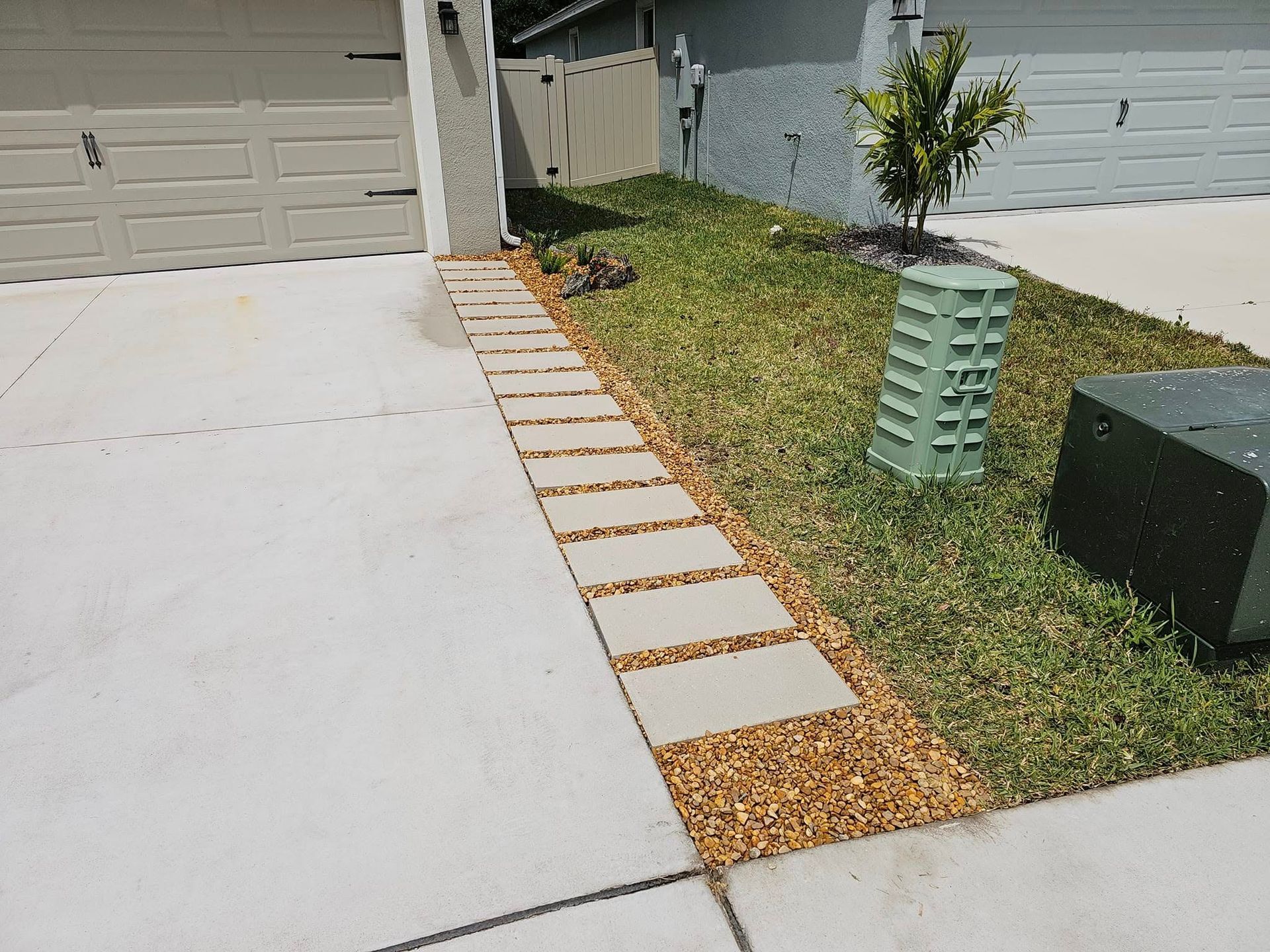 Paver walkway installation with lawn and irrigation landscaping design in Plant City, FL