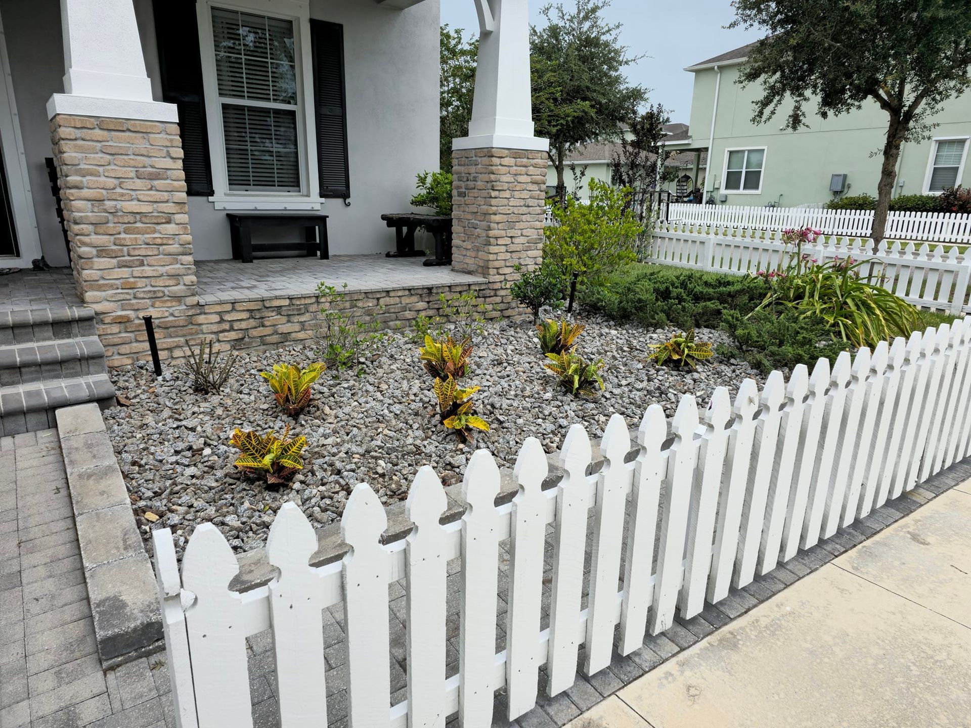 Rock garden landscaping with plant installation and decorative stone beds in Plant City, FL
