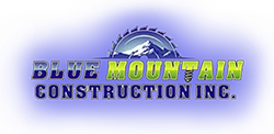 The logo for blue mountain construction inc. has a picture of a mountain on it.