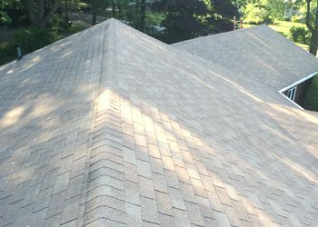 A close up of a roof with shingles on it.