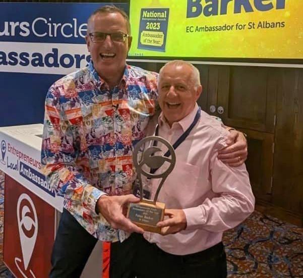 Peter Barker being presented with a Business Award