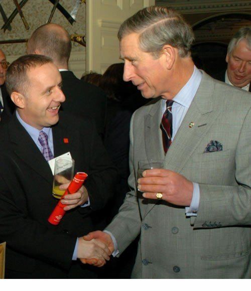 Peter Barker meeting and enjoying a drink with King Charles III