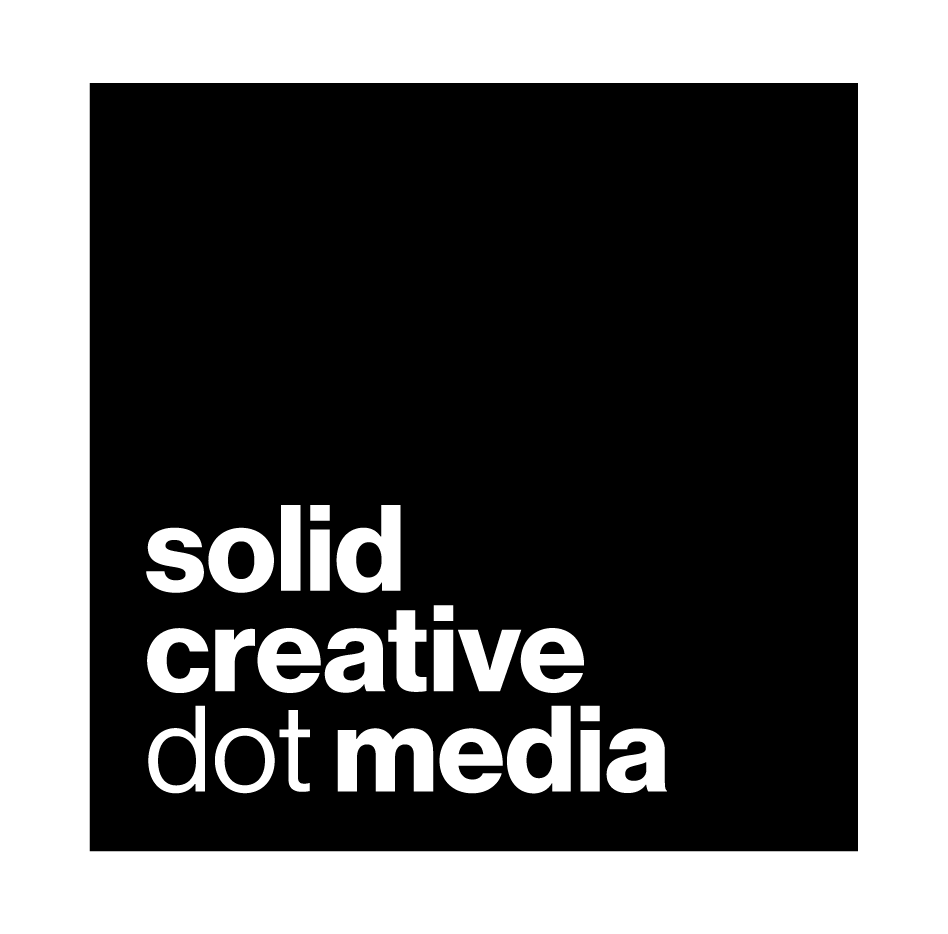 The logo for solid creative dot media is black and white.