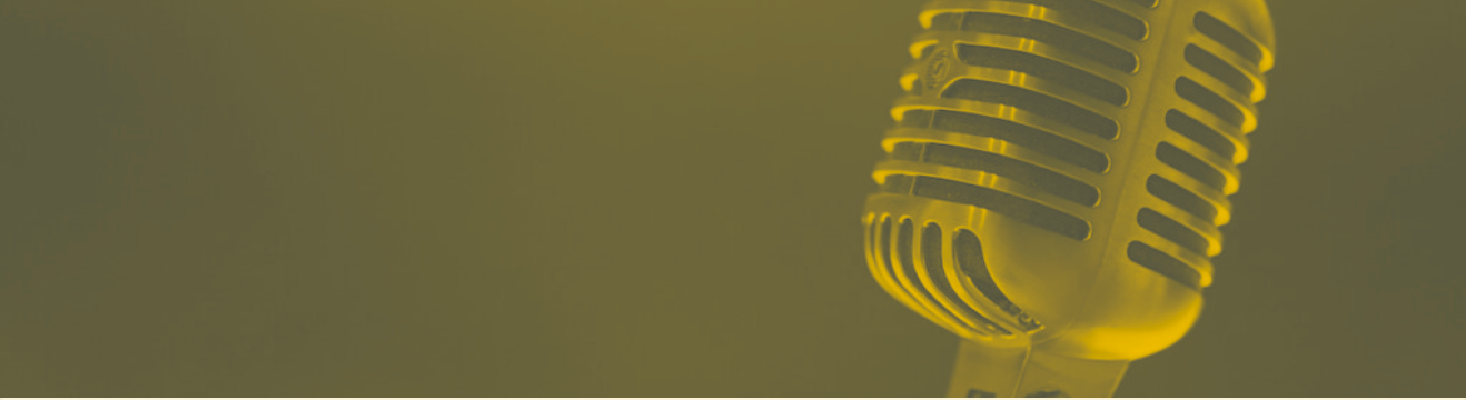 Yellow microphone against a muted yellow-green backdrop, suggesting podcasting or broadcasting.