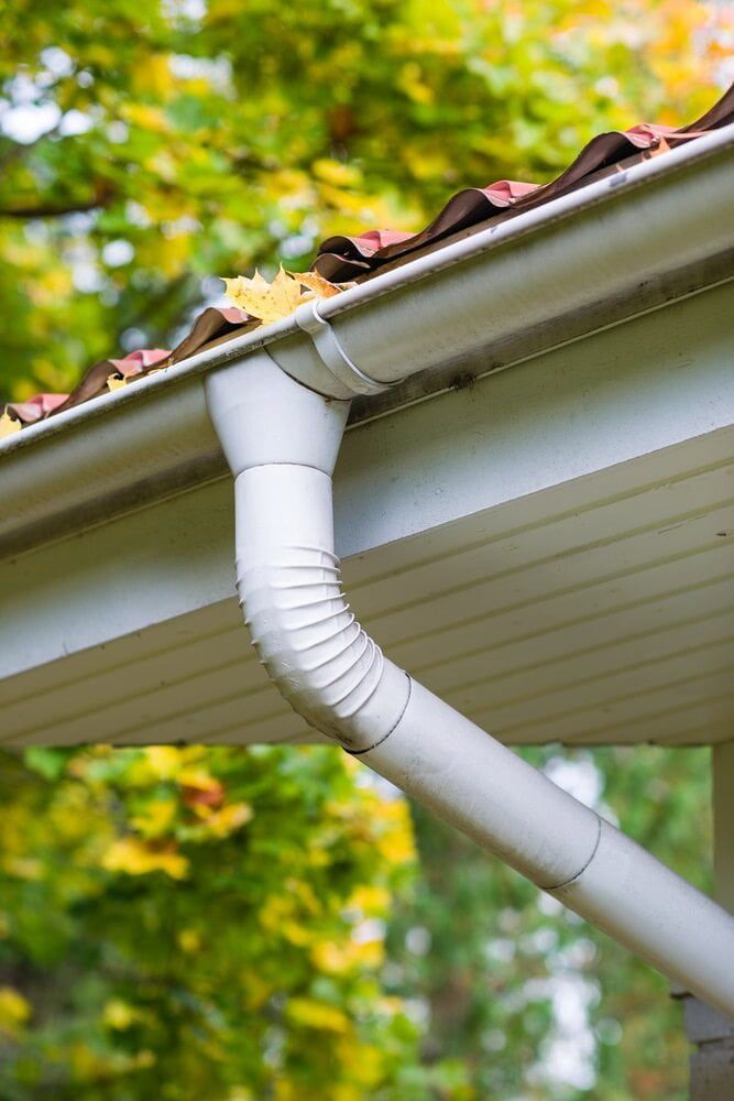 White Gutter With a Downspout, Connected to a Roof — Primed Plumbing & Gasfitting in Eglinton, NSW