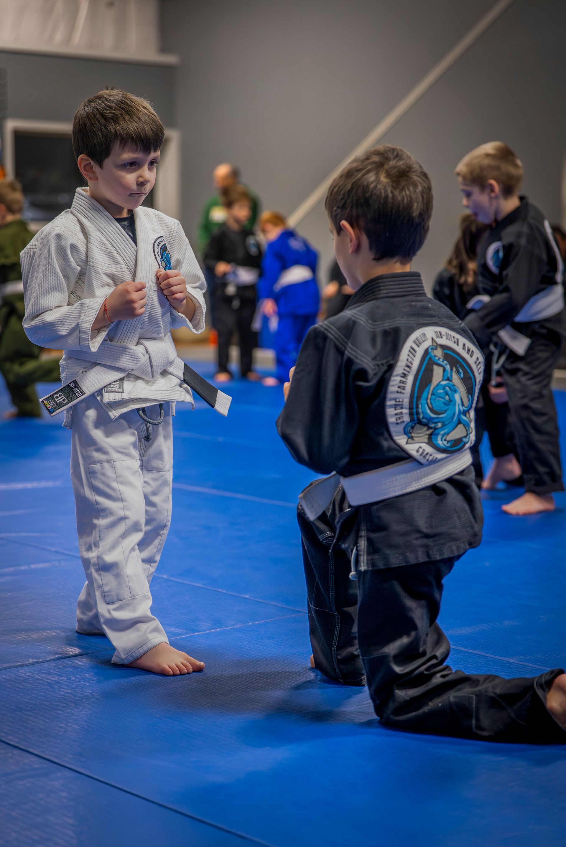 Students drilling Jiu-Jitsu technique at Gracie Jiu-Jitsu Farmington Valley in Canton, CT.
