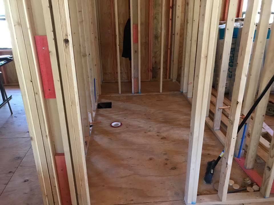A room that is being built with wooden frames