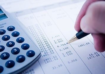 Accountant balancing the accounts — Accounting Services in Eugene, OR