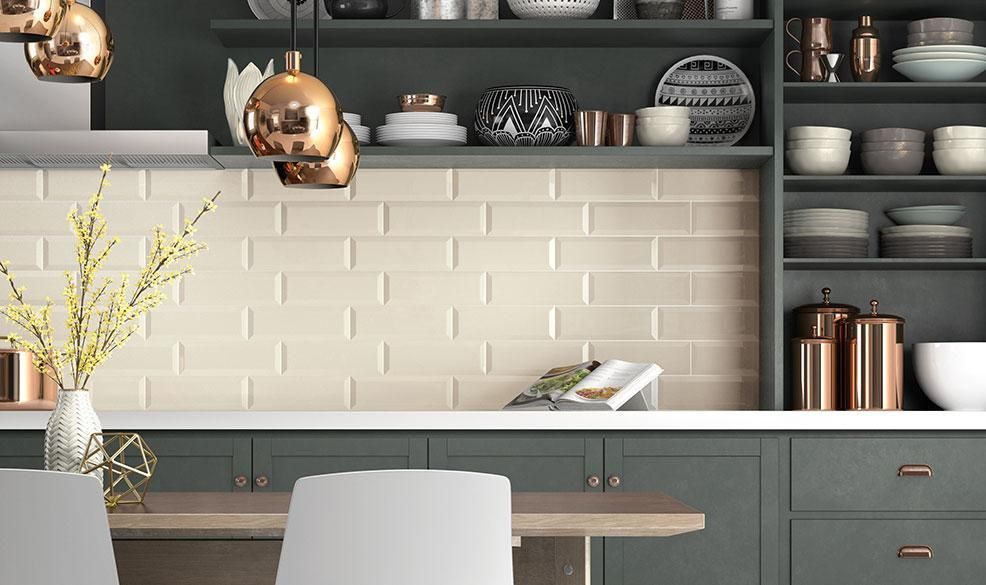 A kitchen with a dining table and chairs and a brick wall.
