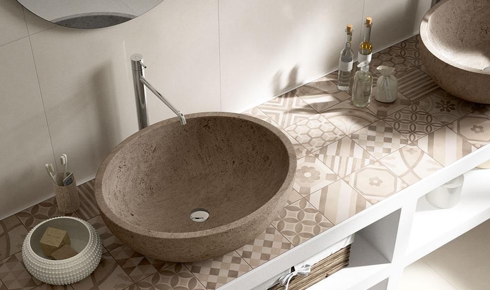 A bathroom with two sinks and a mirror.
