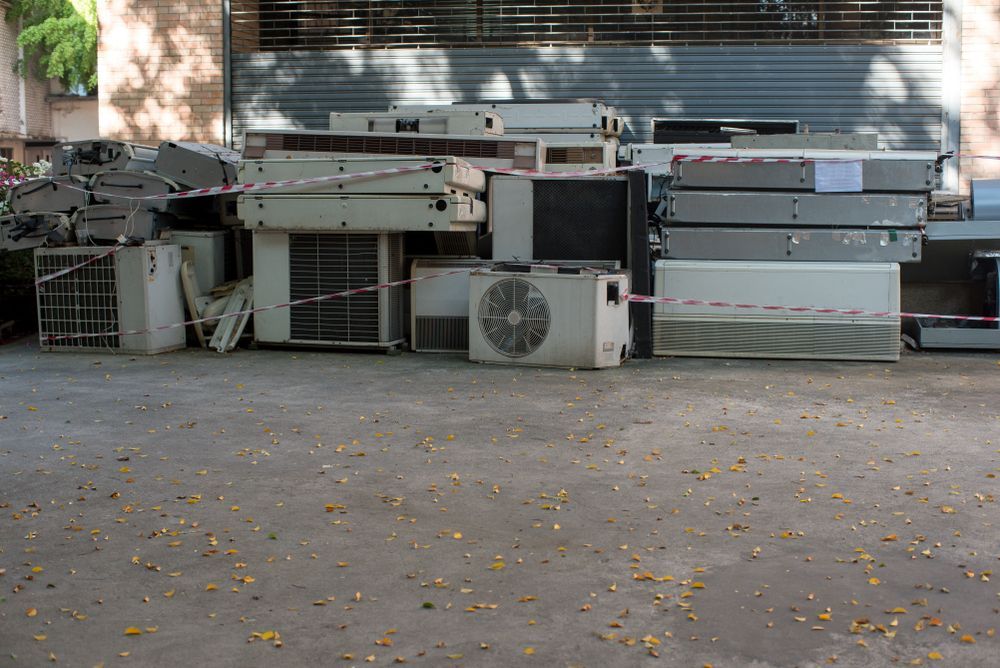 Pile of Discarded Air Conditioning Units — Airweld Services Pty Ltd in Shellharbour, NSW