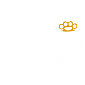 A gold brass knuckles on a white background.