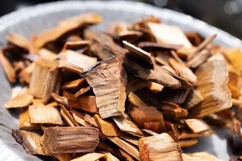 A close up of a pile of wood chips in a bowl