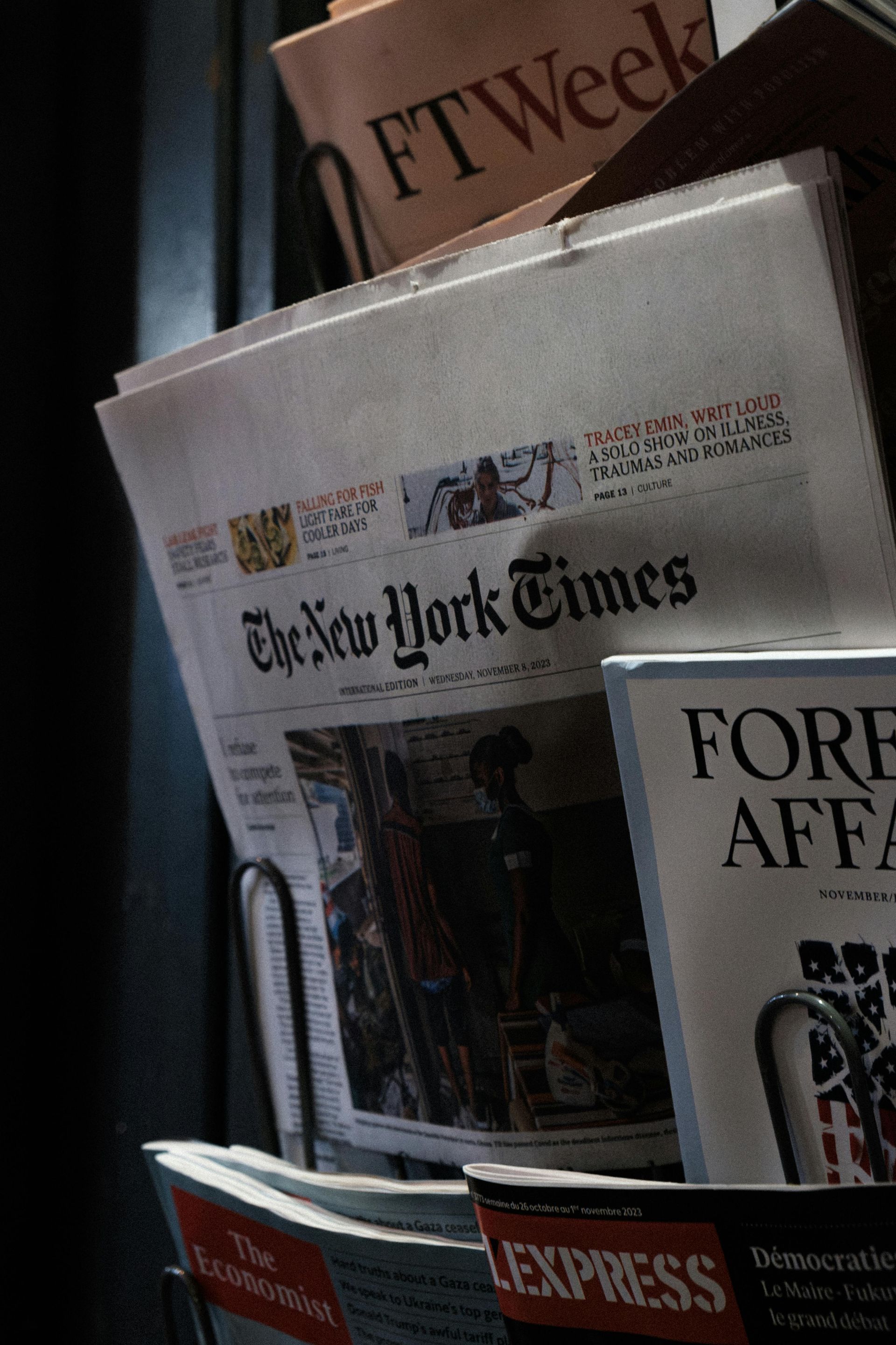 A stack of newspapers including the new york times