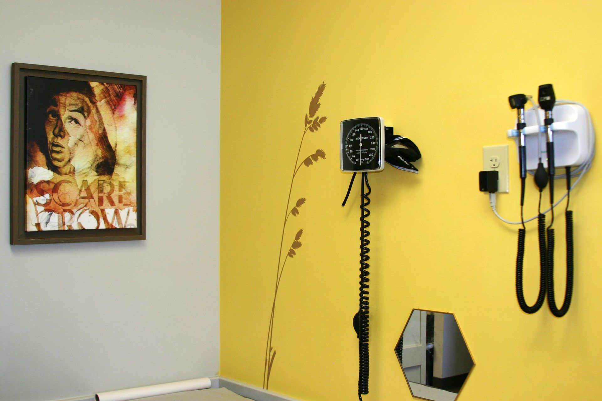 A yellow wall with a picture on it that says scare farm