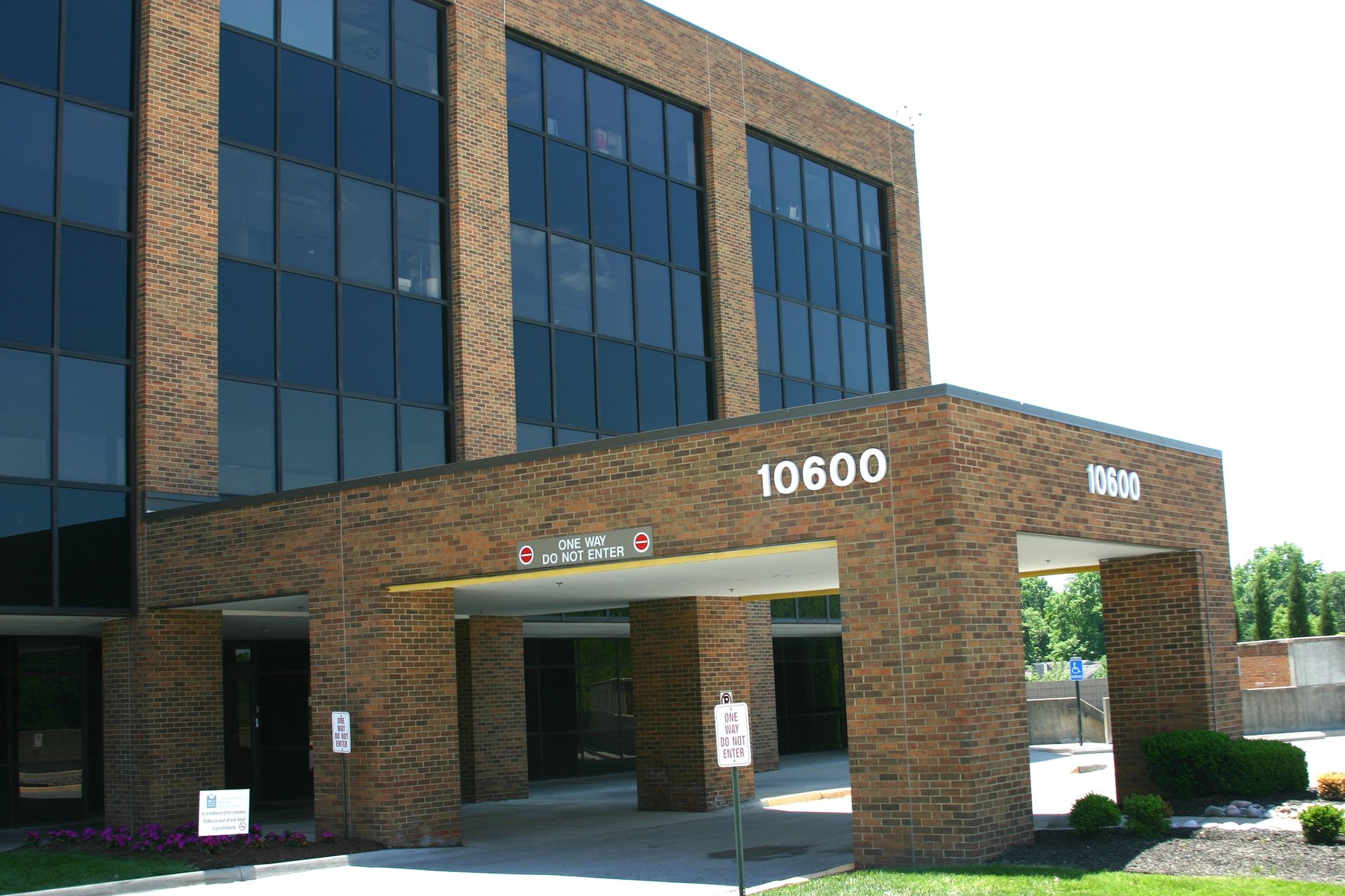 A large brick building with the number 10600 on it