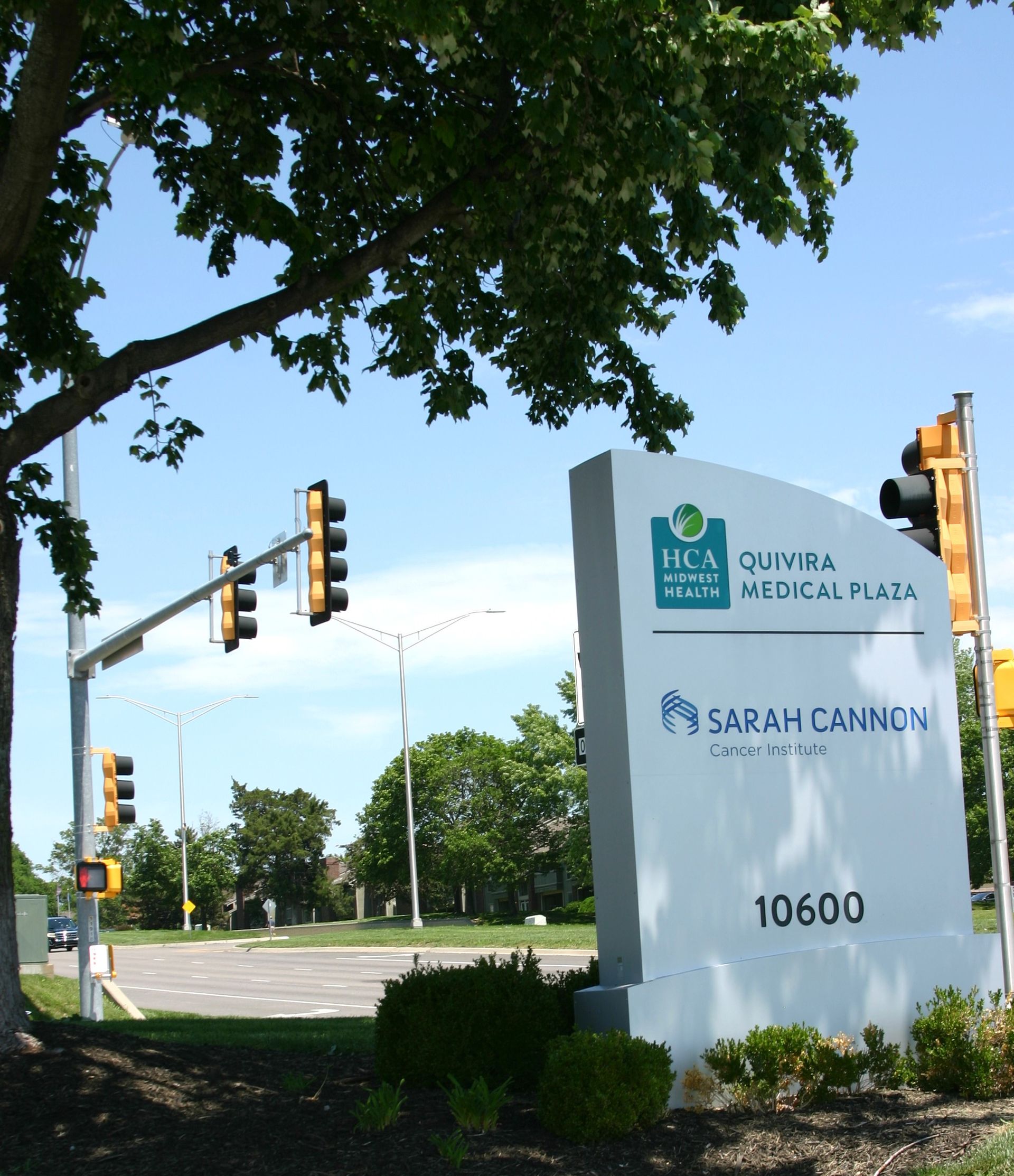 A sign for sarah cannon 's is on the side of the road