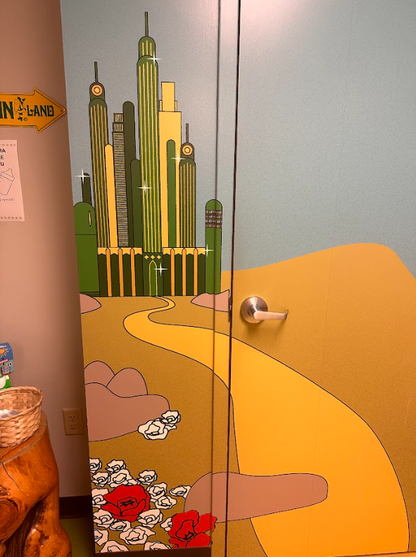 A door with a picture of the wizard of oz on it