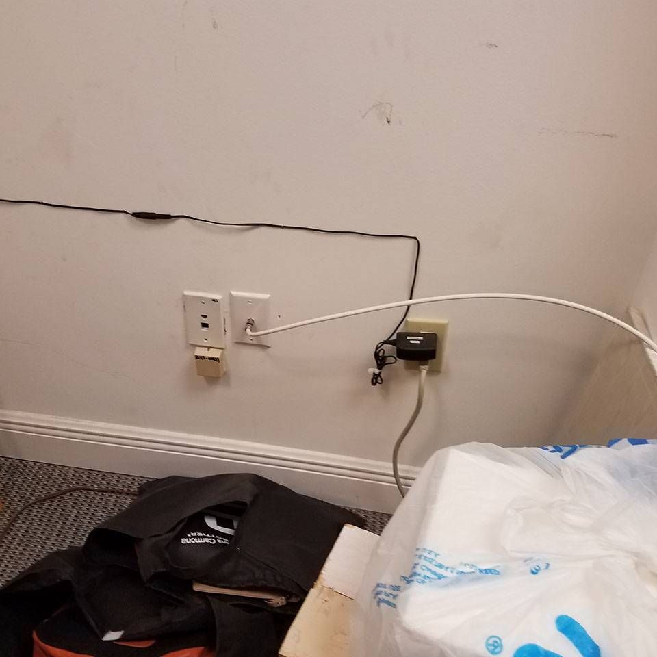 A white bag with a blue letter n on it