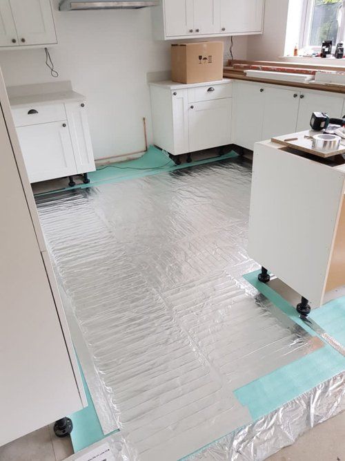 Underfloor hearing installation in newly refurbished kitchen