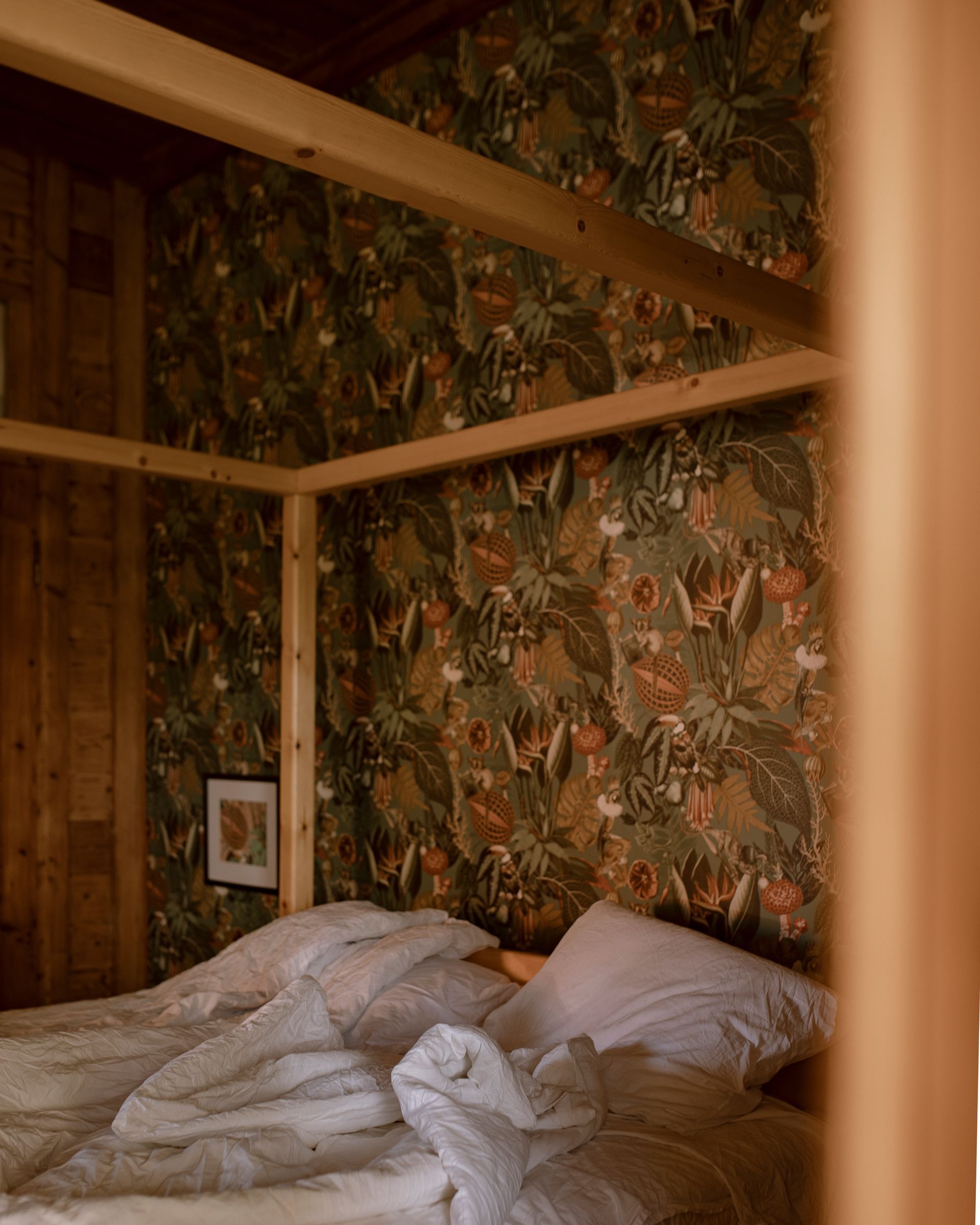 Comfortable four poster bed in a Private Bedroom with floral wallpaper, Shromantic Garden.