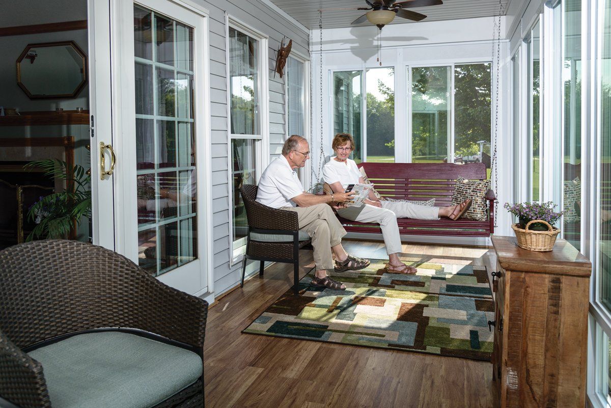 Happy Couple Talking — Langhorne & Bensalem, PA — Besco Windows and Doors Inc.