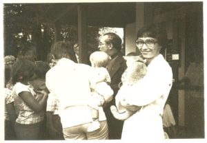 old black and white photo of people with animals