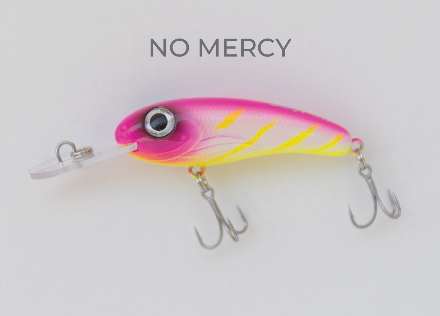 Pink and yellow fishing lure with two treble hooks and a clear bill. Text: NO MERCY.