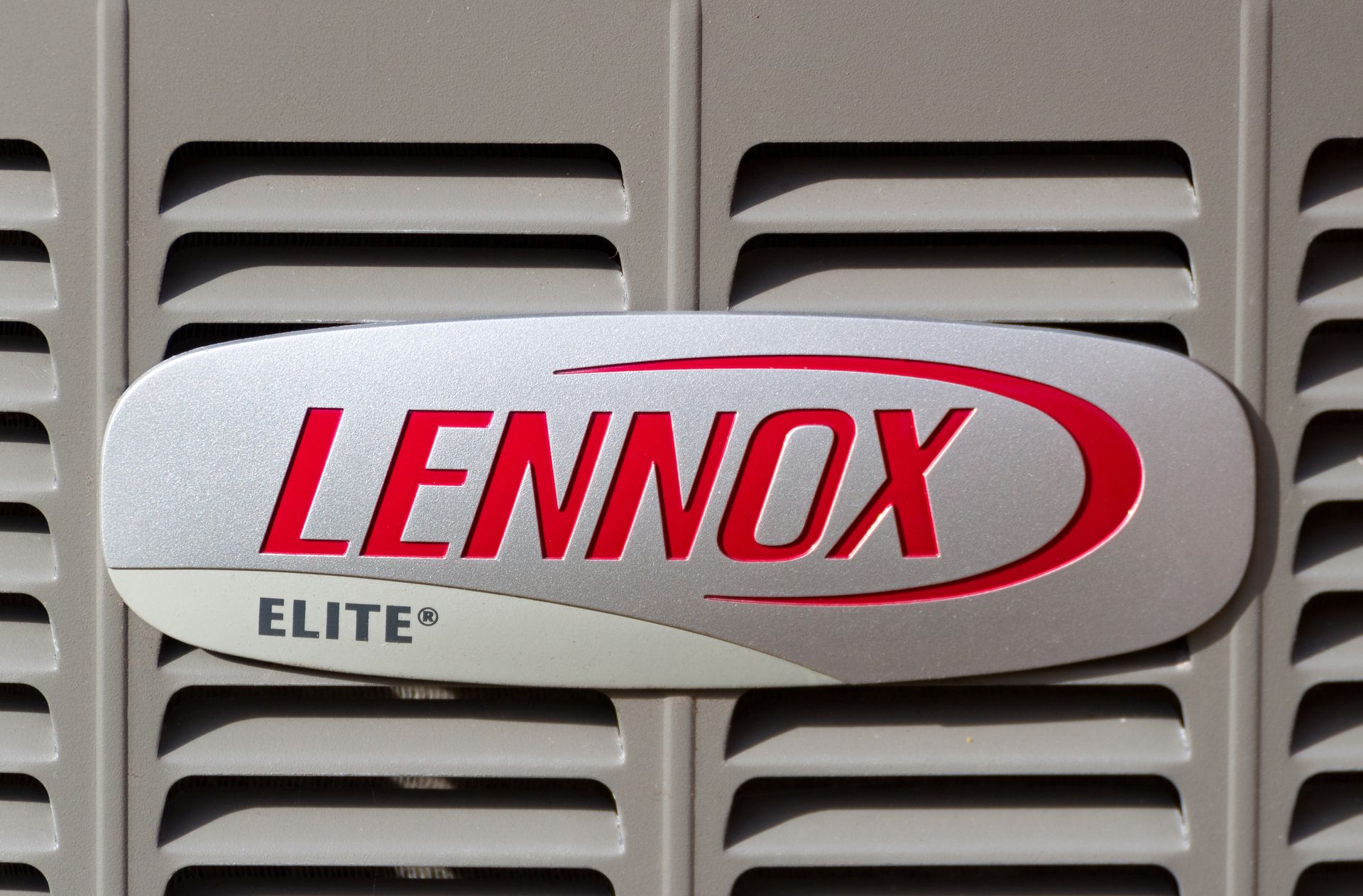 A lennox elite logo is on the side of a building