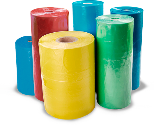 Un montón de rollos de cinta de diferentes colores se apilan uno encima del otro.