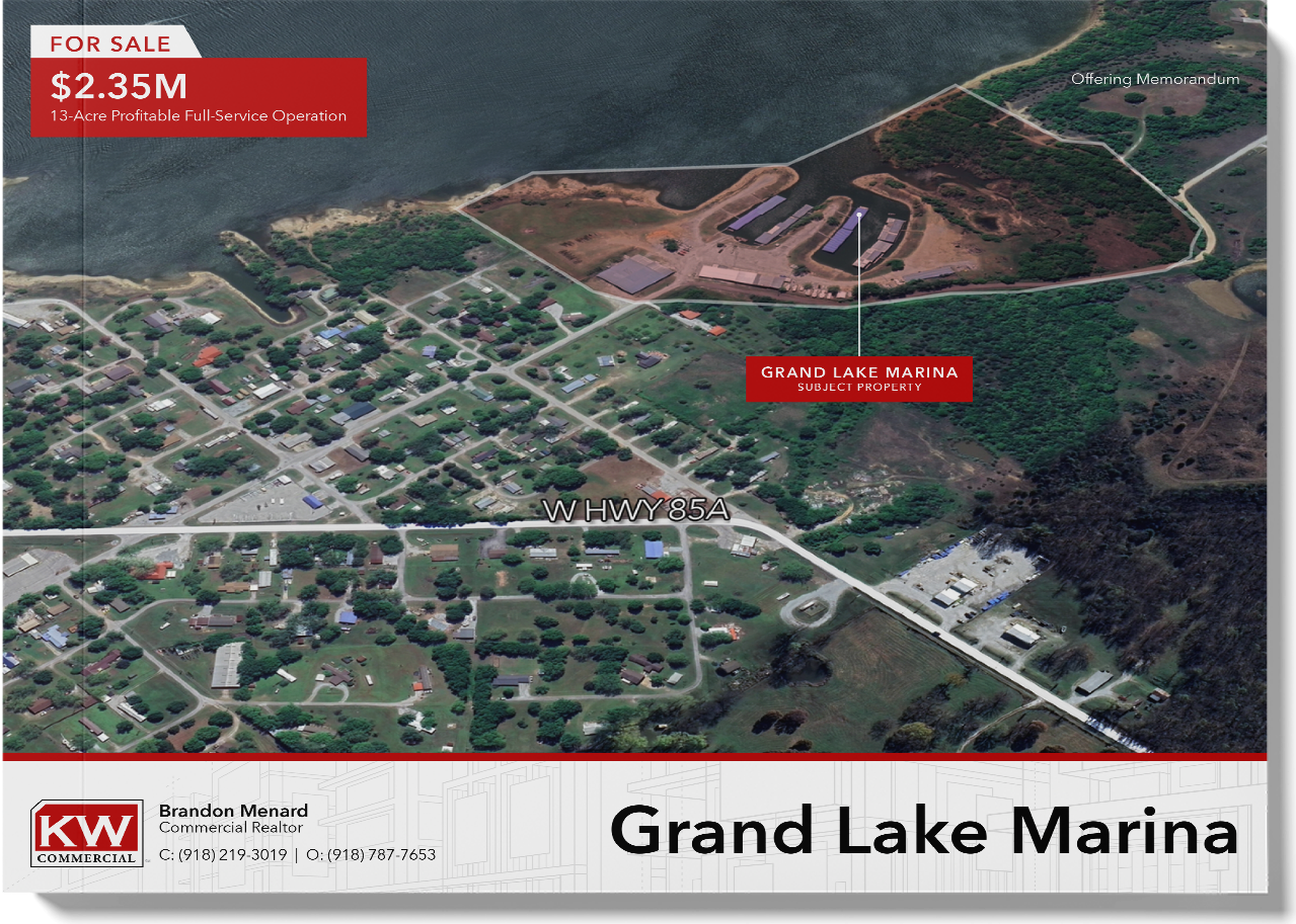 An aerial view of a residential area called grand lake marina.