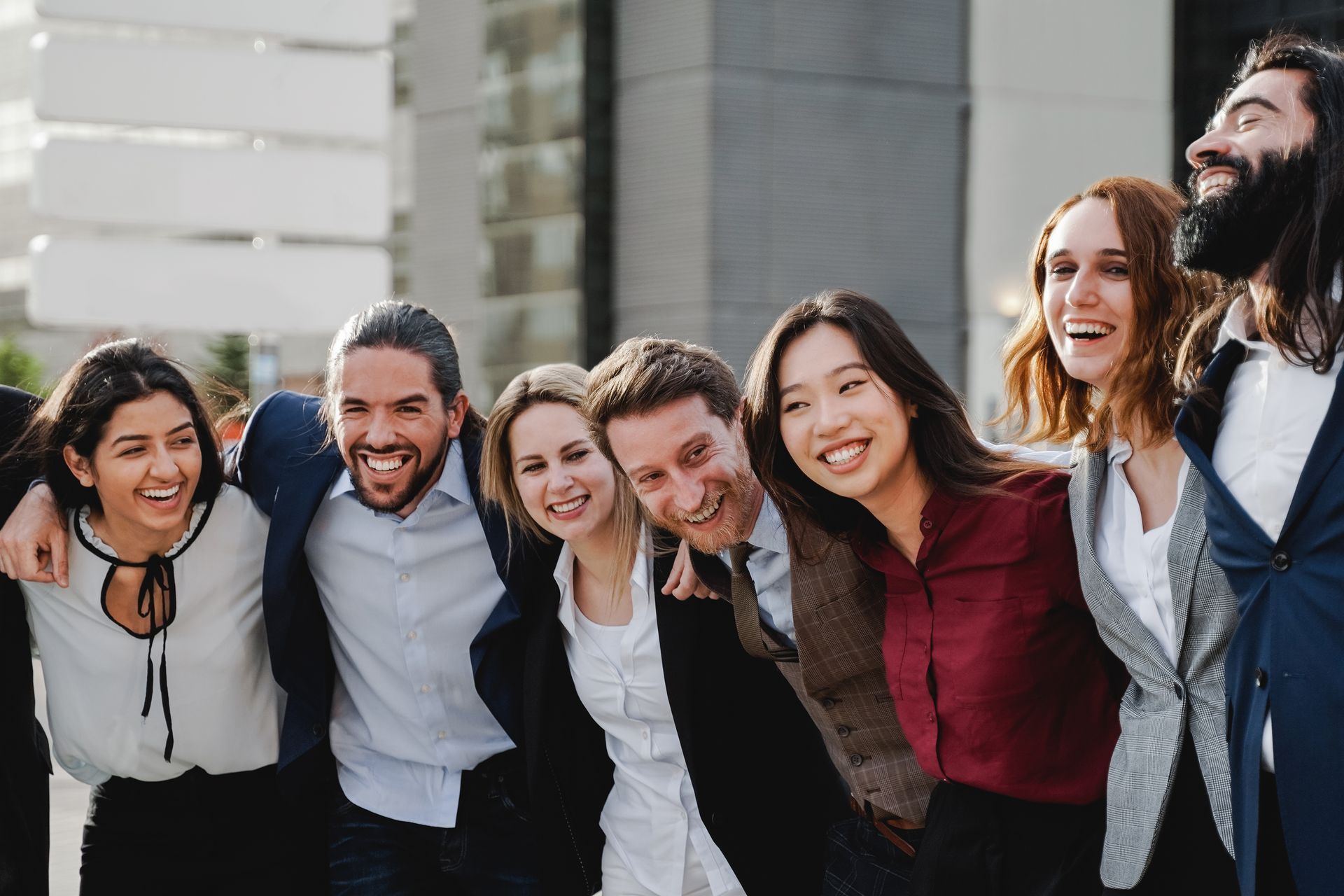 A group of people are posing for a picture together.