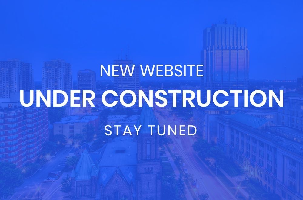A blue background with the words `` new website under construction stay tuned ''.