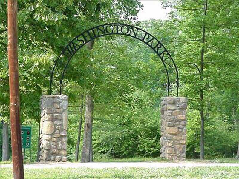 Metal Archways — Iron Arch Leading to a Forest in Winston-Salem, NC