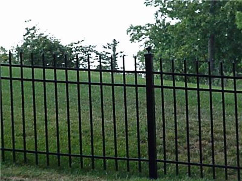 Iron Fence Installation — Thin Fence of a Grassfield in Winston-Salem, NC