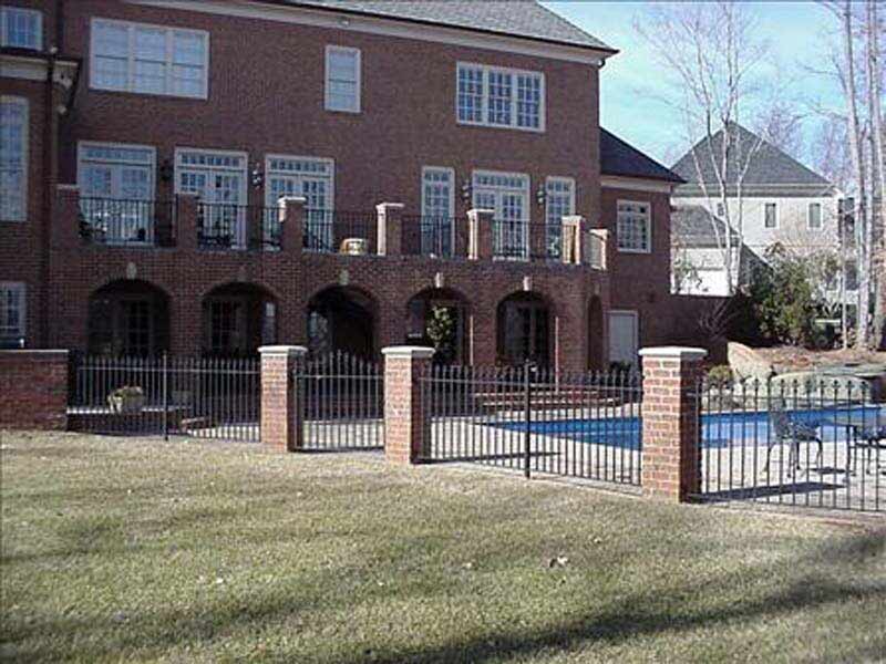 Residential Fence Installation — Fence of a Large House in Winston-Salem, NC