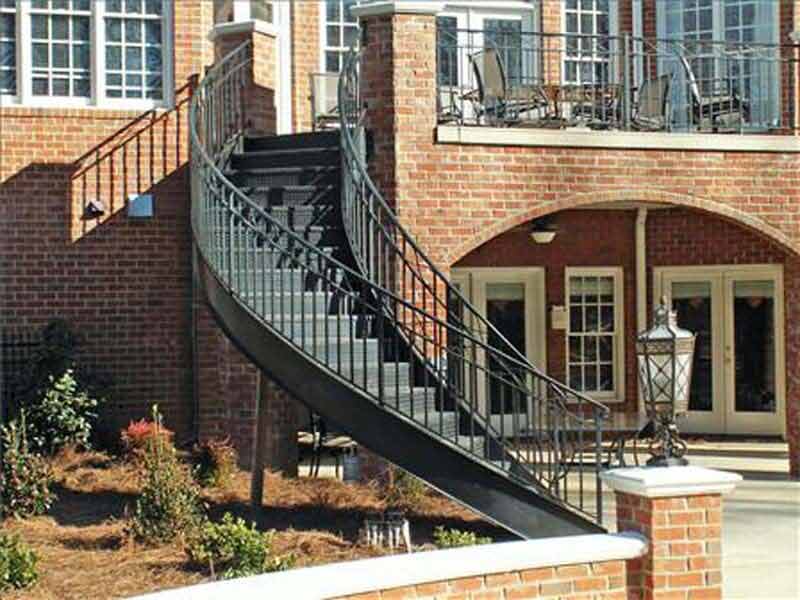 Spiral Stairwells — Long Curved Stairs of a Mansion in Winston-Salem, NC