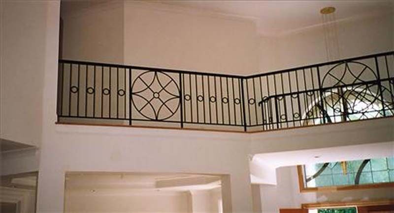Staircase Iron Designs — Hand Railings with Circular Designs in Winston-Salem, NC
