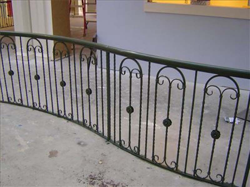 Stairwell Installation — Curved Iron Stairs Outside in Winston-Salem, NC