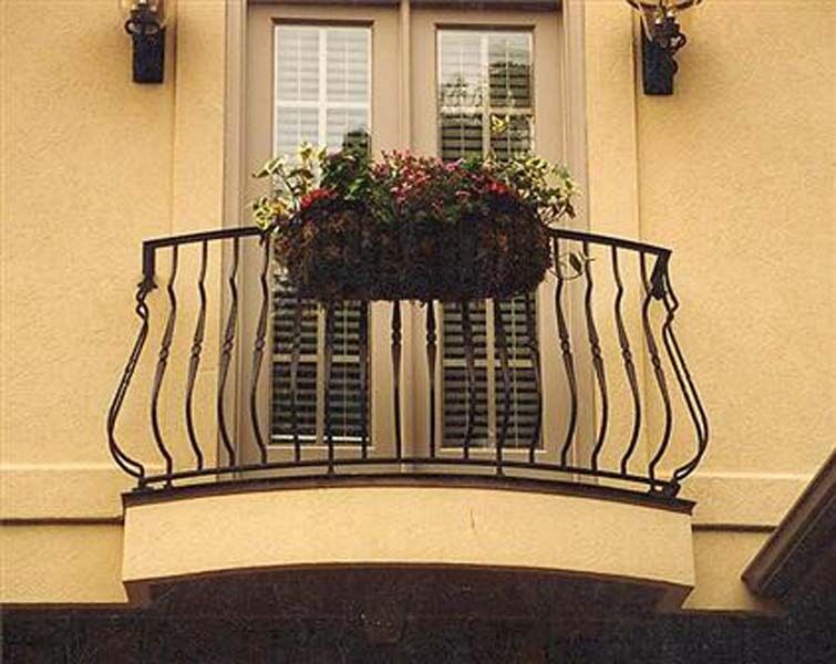 Metal Balcony — Building Balcon with a Hanging Plants in Winston-Salem, NC