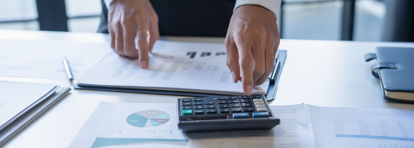 A man doing calculations for the yearly budget