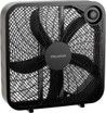 A black box fan with a mesh cover is sitting on a white surface.