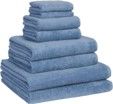 A stack of blue towels stacked on top of each other on a white background.