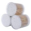 Three cotton swabs are stacked on top of each other on a white background.