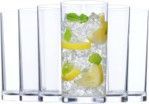 A glass filled with ice and lemon slices.
