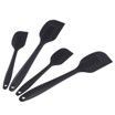 A set of four black silicone spatulas on a white background.