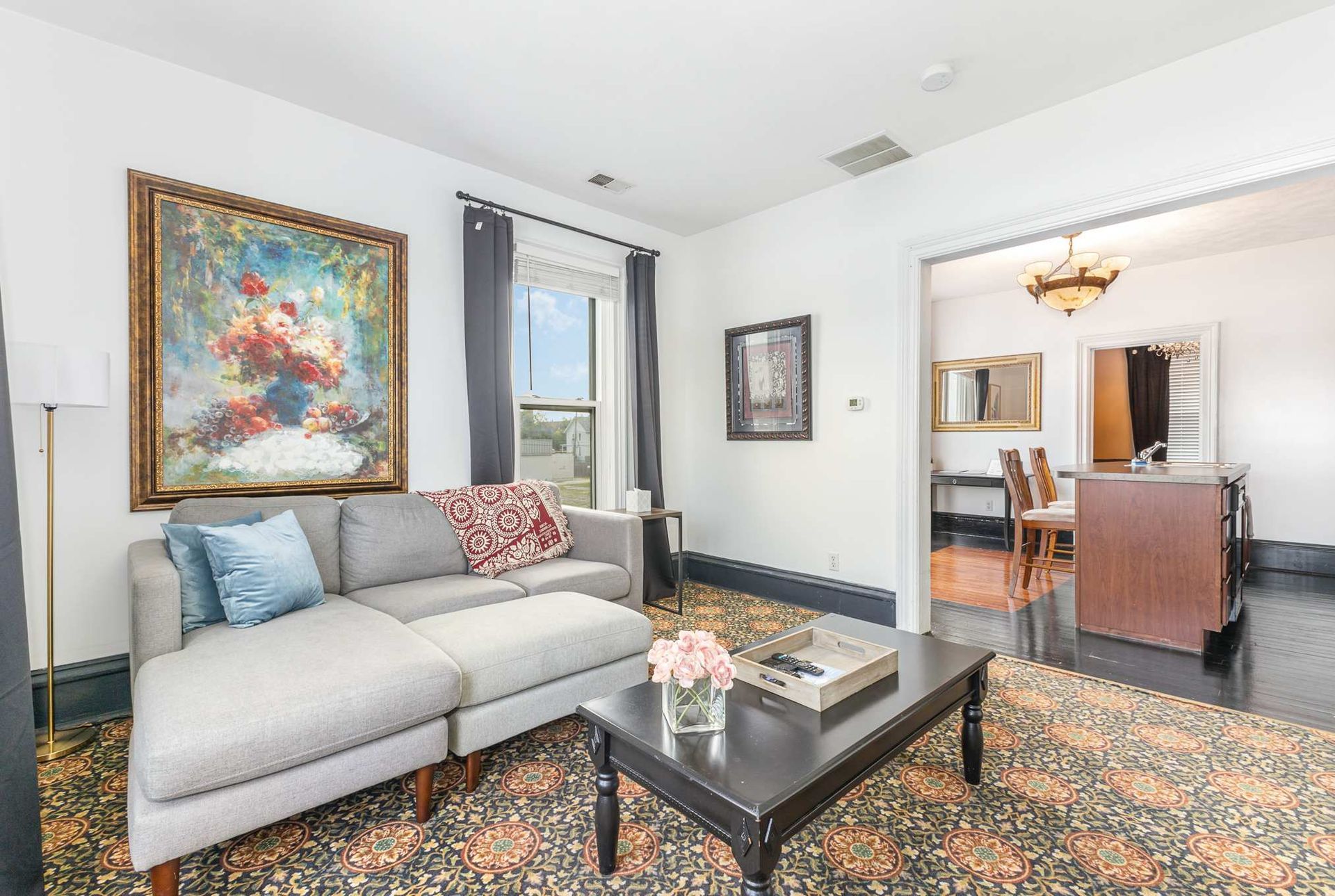 A living room with a couch and a coffee table